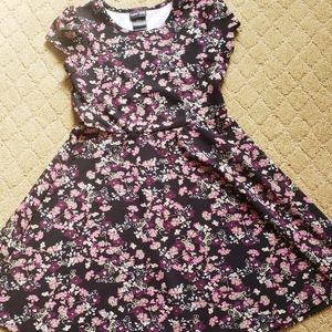 Girls black floral dress 96% polyester, 4% spandex.  Never worn.